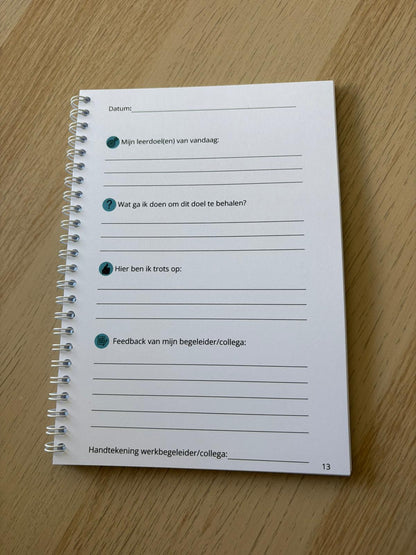 Het eerste hulp bij leerdoelen en feedback schriftje
